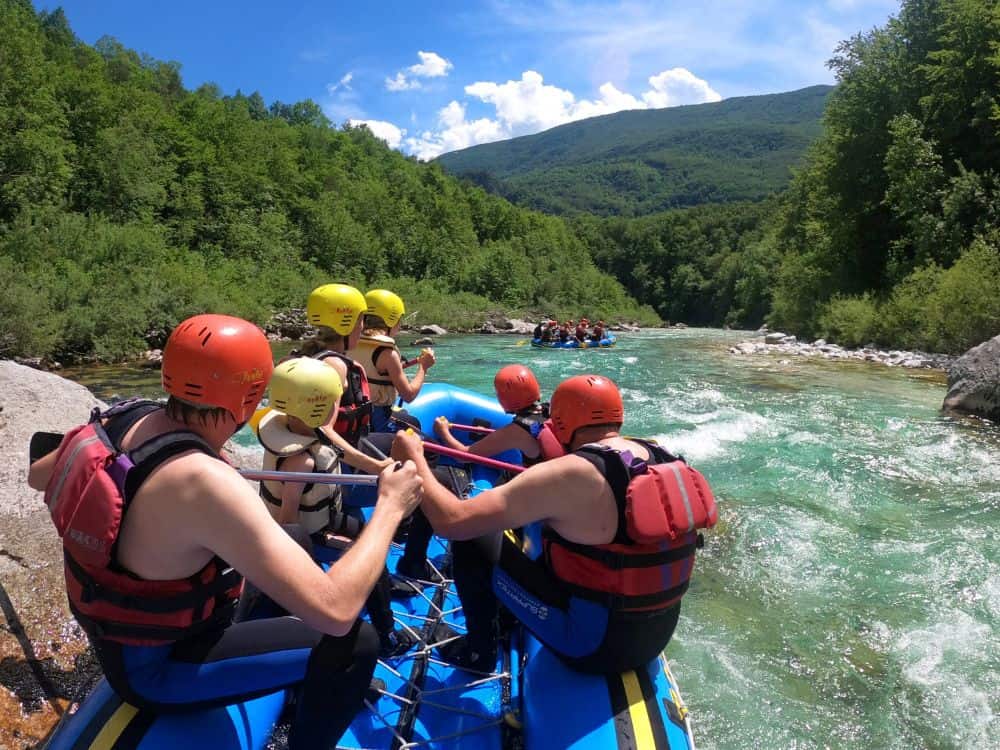 Family rafting on Soča River in Bovec, Slovenia