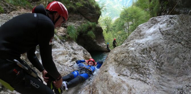Group canyoning adventure in Sušec Canyon Groups of adventurers canyoning together in Sušec, Soča Valley, Slovenia