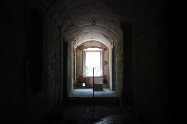 Interior of Fort Hermann near Bovec Inside Fort Hermann with light streaming through a window